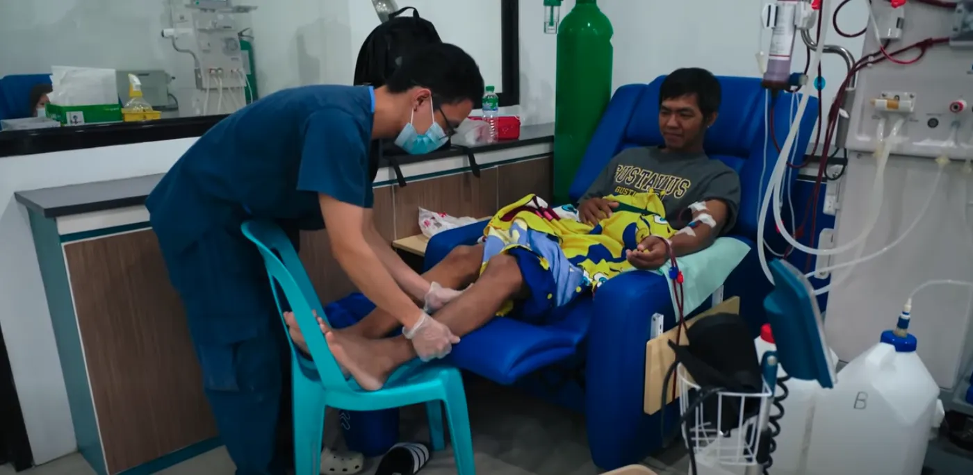 A TresMedica nurse caring for a hemodialysis patient during treatment