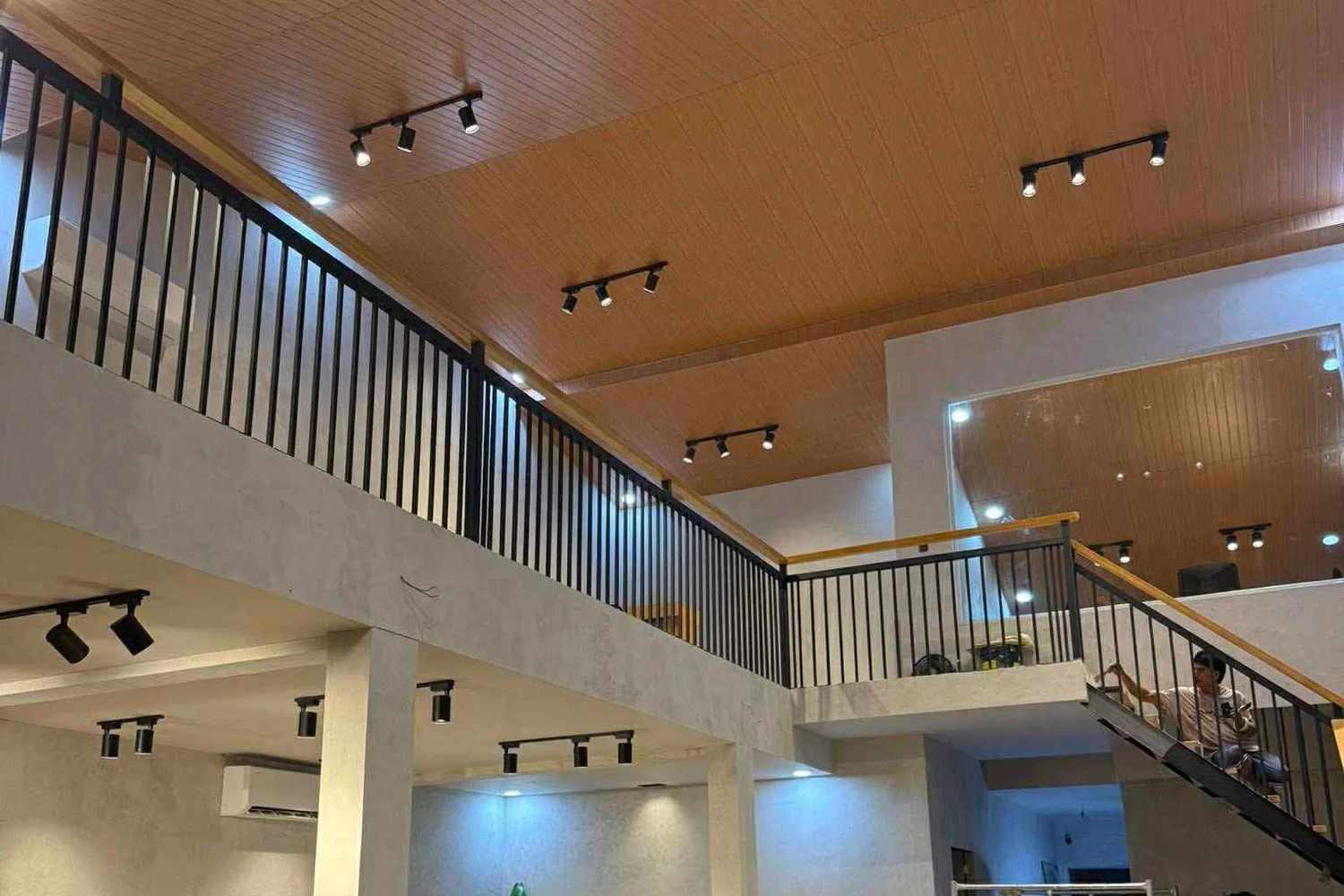 The double-height lobby and staircase inside the TresMedica head office